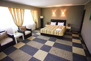 Кровать или кровати в номере Актау Отель 