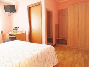 Postel nebo postele na pokoji v ubytování Hotel Ristorante Al Bassanello