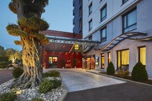 Gallery image of Kyriad Prestige Lyon Est - Saint Priest Eurexpo Hotel and SPA in Saint-Priest