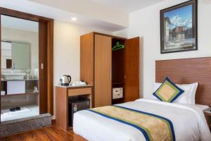 Letto o letti in una camera di Oasis Kathmandu Hotel