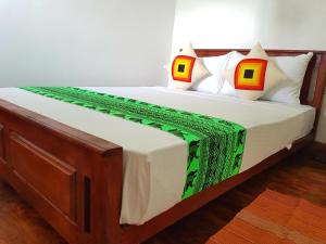 Letto o letti in una camera di Sigiri Heritage Villa