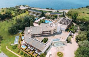 an overhead view of a building with solar panels on its roof at Alexander Beach Hotel & Spa in Alexandroupoli