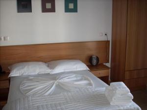 Кровать или кровати в номере Sea Breeze Hotel