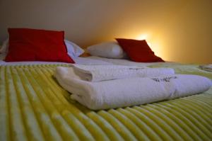 
Łóżko lub łóżka w pokoju w obiekcie Jaśminowe Wzgórze
