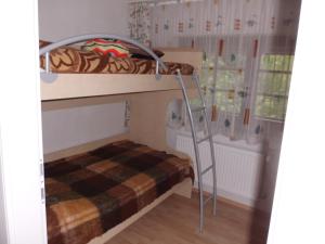 A bed or beds in a room at Fewo-Lenz