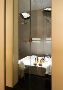 Vonios kambarys apgyvendinimo įstaigoje Mercure Villefranche en Beaujolais