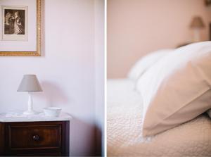 Een bed of bedden in een kamer bij La Casetta Di Filippo E Chiara