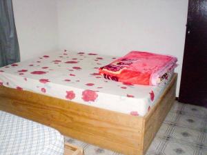 A bed or beds in a room at Casa Para Locação