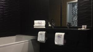 Bilik mandi di Motel Venus Madrid Norte
