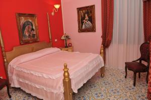 Postel nebo postele na pokoji v ubytování Albergo Roses