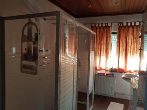 a bathroom with a toilet and a sink in a room at Villa da Melis in Buarcos +98 photos