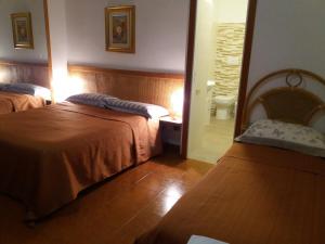 A bed or beds in a room at Villa Betta