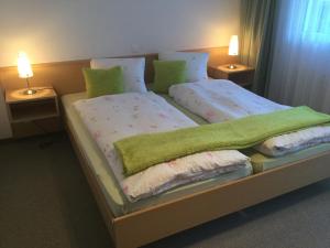 Ένα ή περισσότερα κρεβάτια σε δωμάτιο στο Haus Mondelli