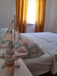 Postel nebo postele na pokoji v ubytování Apartment Renata + 21 fotografií