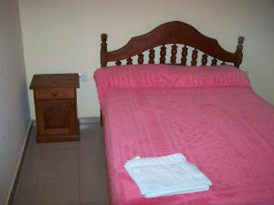 Postel nebo postele na pokoji v ubytování Cabañas y Hotel Ebemys