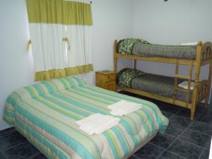 Postel nebo postele na pokoji v ubytování Cabañas y Hotel Ebemys + 37 fotografií