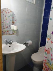 Koupelna v ubytování Mr. Tenloy's Place