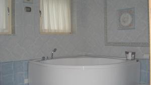 Koupelna v ubytování Hotel Garni Vittoria