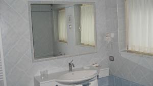 Koupelna v ubytování Hotel Garni Vittoria