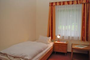 Postel nebo postele na pokoji v ubytování Gästehaus Golker