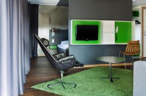 TV a/nebo společenská místnost v ubytování Comfort Hotel RunWay