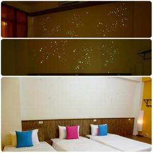Rúm í herbergi á I Star Bed and Breakfast