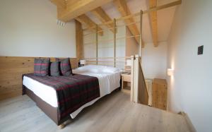 Postel nebo postele na pokoji v ubytování Hotel San Giacomo Spa&Gourmet