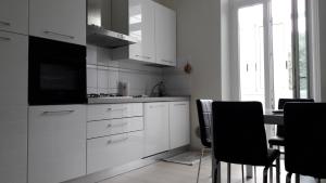Η κουζίνα ή μικρή κουζίνα στο Residenza Lux fronte mare