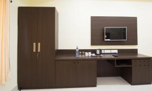 TV o dispositivi per l'intrattenimento presso Treebo King'S Court Chandrasekharpur
