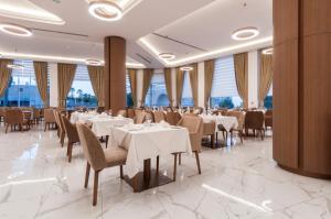 Vivaldi Hotel餐厅或其他用餐的地方