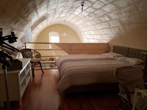 A bed or beds in a room at Casa Elena