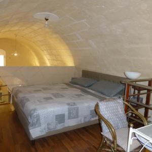 A bed or beds in a room at Casa Elena