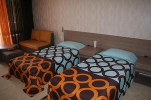 A bed or beds in a room at Spa Hotel Ata
