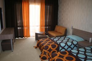 A bed or beds in a room at Spa Hotel Ata