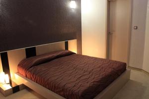 A bed or beds in a room at Spa Hotel Ata