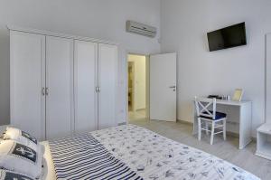 Posteľ alebo postele v izbe v ubytovaní Holiday Home Casa Histria