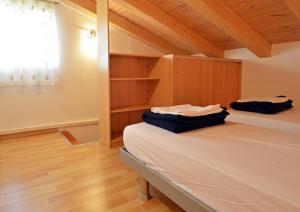 Łóżko lub łóżka w pokoju w obiekcie Villa Blue 2