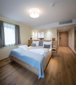Postel nebo postele na pokoji v ubytování Design Hotel Frauenschuh