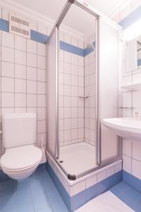 Koupelna v ubytování Hotel-Pension Das Platzl + 37 fotografií
