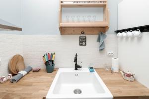 Ванна кімната в Sea Crib Apartment