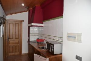 Kuchyň nebo kuchyňský kout v ubytování Apartamentos Rurales Natura