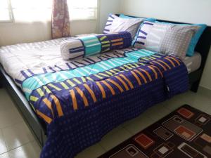 Posteľ alebo postele v izbe v ubytovaní HomeStay D 11 Putrajaya NETFLIX WIFI