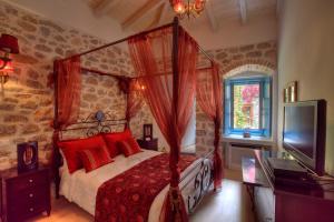 Postel nebo postele na pokoji v ubytování PortaDelMare deluxe suites