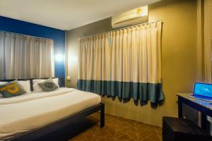 Postel nebo postele na pokoji v ubytování Pak-Up Hostel