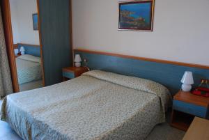 Кровать или кровати в номере Hotel Stella Maris