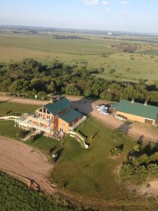 an aerial view of a large house with a green roof at ReWild Ranch LLC in Sargent