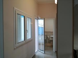 a mirror on a wall in a room at La Casa del Professore in Santa Teresa di Riva +92 photos