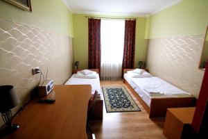 Postel nebo postele na pokoji v ubytování FusGym Resort + 12 fotografií