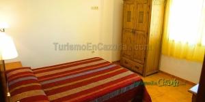A bed or beds in a room at Alojamientos Rurales La Higuerilla Sierra de Cazorla