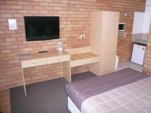 Kuchyň nebo kuchyňský kout v ubytování Grong Grong Motor Inn